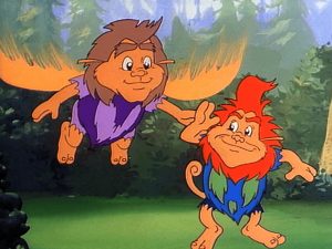 A still from the "Ewoks" cartoon. Oobel and Mring-Mring, two Gupins, roughly humanoid creatures. Oobel has wings, and flies slightly above Mring-Mring.